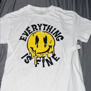 White T-Shirt with Yellow Smiley Face Graphic